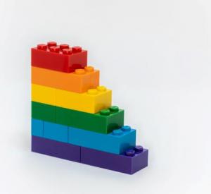 Lego building block bricks staked in rainbow order